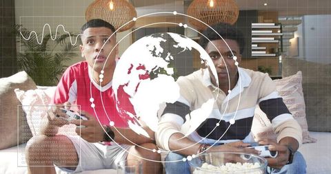 Playing intense couch multiplayer with controllers, popcorn and augmented reality globe hud