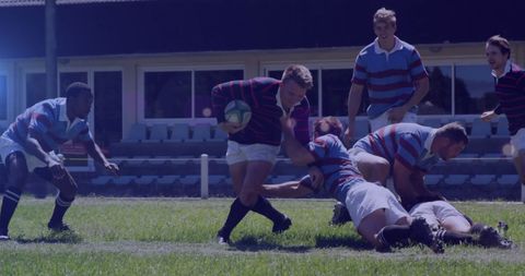Intense rugby match players in action at stadium
