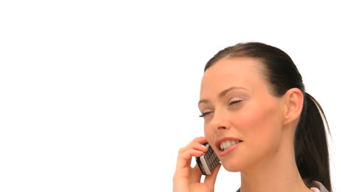 Close-Up Portrait of Woman on Phone Call Smiling Intently Against White Background