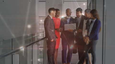 Business Professionals Analyzing Data on Tablet with Connection Network Animation