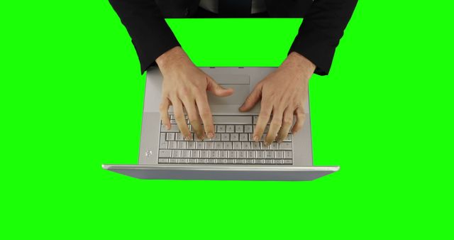 Top View of Hands Typing on Laptop Keyboard With Green Screen Background - Download Free Stock Images Pikwizard.com