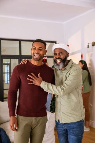 Father and Son Sharing Warmth During Christmas Celebration
