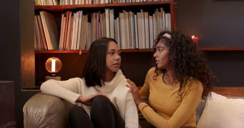 Female Friends Having Meaningful Conversation at Home