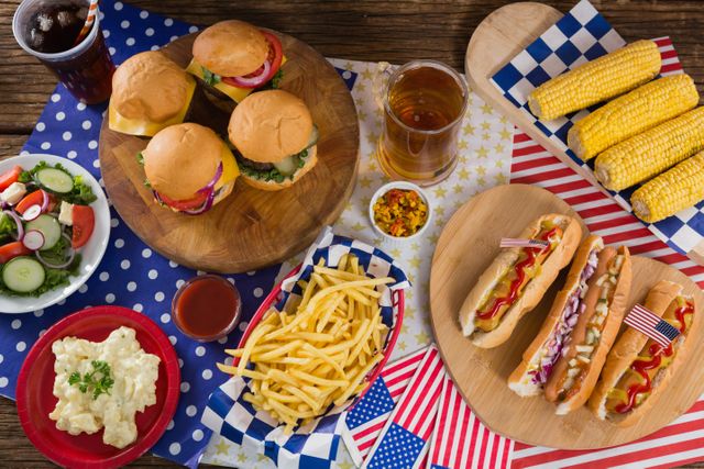 Hot dogs and burgers on wooden table with 4th july theme - Download Free Stock Photos Pikwizard.com