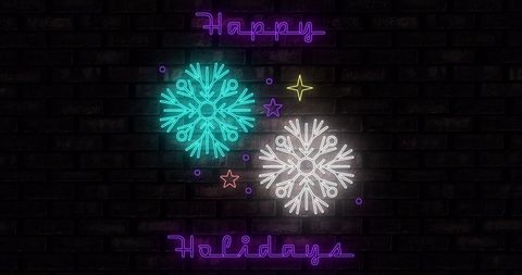 Neon happy holiday text with glowing snowflakes on black background