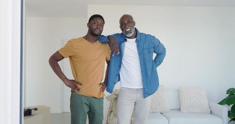 Father and Son Bonding While Unpacking in New Home