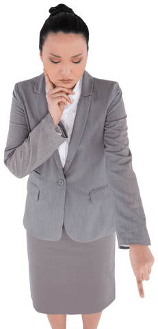Serious Asian Businesswoman Pointing Down on Transparent Background