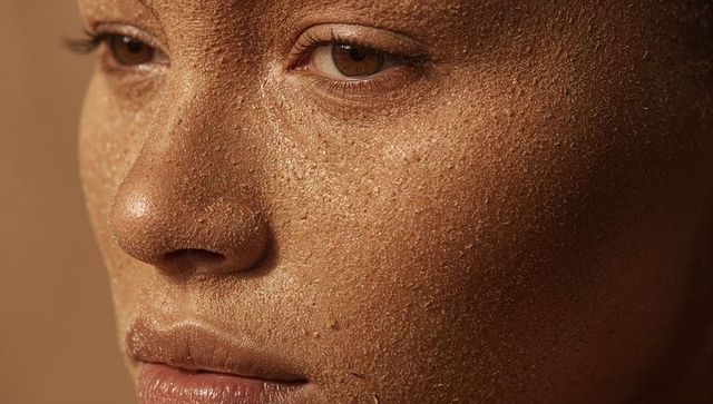 Closeup of Woman with Natural Exfoliating Scrub on Face Showing Texture and Healthy Skin