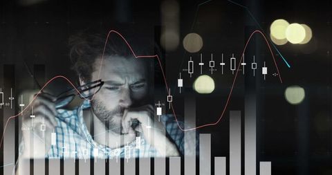 Business Professional Analyzing Data with Graphs and COVID-19 Interface - Download Free Stock Images Pikwizard.com