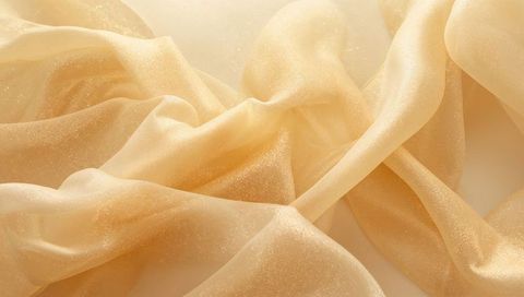 Sheer Pale-Gold Organza Draping with Sparkle Sheen and Soft Luster Textile Background
