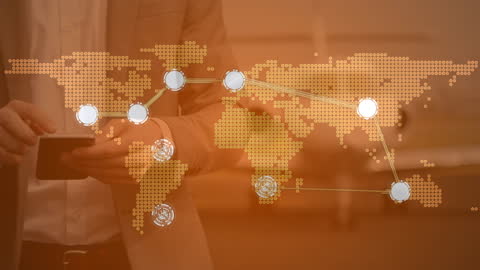 Caucasian Businessman Using Smartphone with Digital World Map Overlay