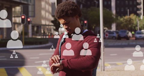 Man Engaging with Digital Interface on Smartwatch Outdoors - Download Free Stock Images Pikwizard.com