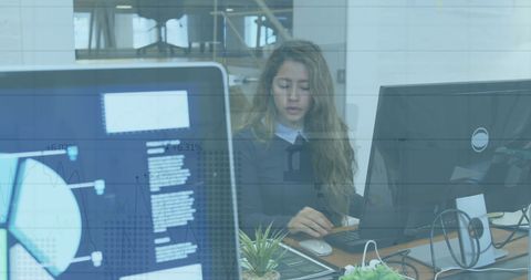 Businesswoman Processing Financial Data in Modern Office