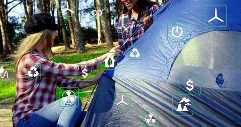 Campers assembling tent in forest with augmented reality eco icons promoting sustainability