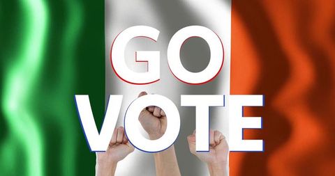 Go vote irish tricolor with raised fists for civic action and voter mobilization
