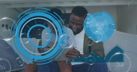 Father and Son Discovering 5G Technology at Home