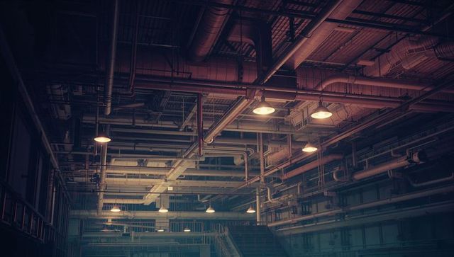 Industrial Factory Ceiling with Pipes and Ducts