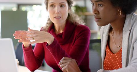 Two Diverse Businesswomen Collaborating in Modern Office - Download Free Stock Images Pikwizard.com
