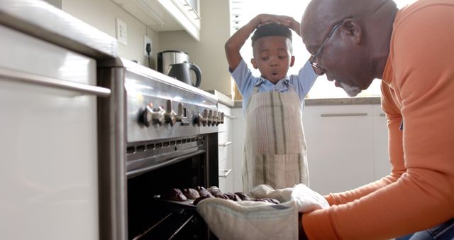 Grandfather and Grandson Baking Cookies Together in Kitchen - Download Free Stock Images Pikwizard.com