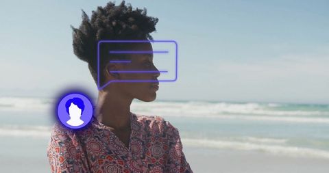Woman with short curly hair contemplating at beach with digital interface overlay