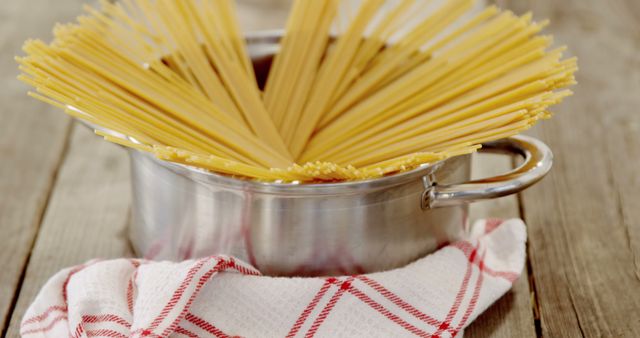 Pasta Boiling in Stainless Steel Pot with Red Checkered Towel - Download Free Stock Images Pikwizard.com