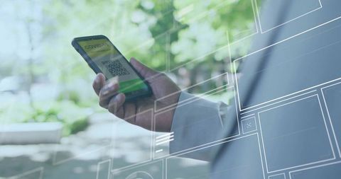 Businessman Holding Smartphone with COVID Pass Outdoors