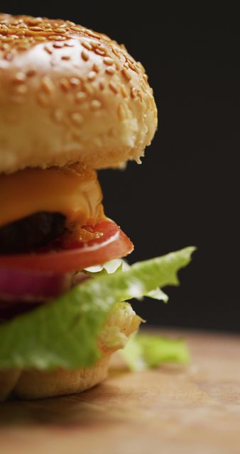 Close-Up of Fresh Homemade Cheeseburger with Lettuce and Tomato - Download Free Stock Images Pikwizard.com