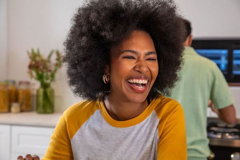 Joyful Couple Bonding in Modern Kitchen