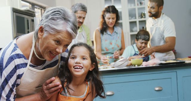 Mixed Generation Family Enjoying Cooking Together in Modern Kitchen - Download Free Stock Images Pikwizard.com