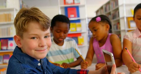 Diverse Schoolchildren Engaged in Collaborative Classroom Study
