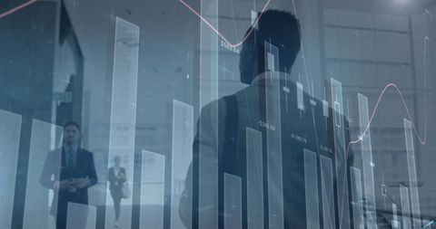 Businessman Overlapping with Digital Charts in Modern Office Setting - Download Free Stock Images Pikwizard.com