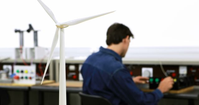 Engineer Testing Wind Turbine Model in Modern Laboratory Setting - Download Free Stock Images Pikwizard.com