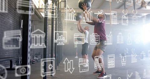 Group fitness class enhancing coordination with medicine ball body workout