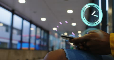 Digital Time Management Concept with Smartphone and Clock