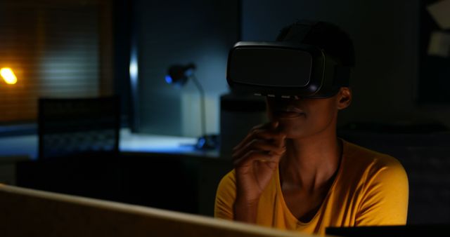 Man Experiencing Virtual Reality Technology in Dark Room - Download Free Stock Images Pikwizard.com