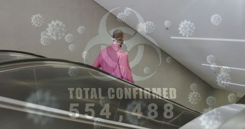Covid-19 pandemic escalation amid biohazard symbols and case numbers