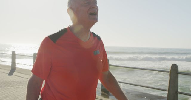 Senior Man Enjoying Morning Run by Ocean - Download Free Stock Images Pikwizard.com