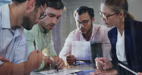 Innovative Team Collaborating on Data Analysis