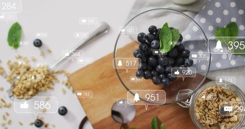 Serving fresh blueberries and granola with social media notifications overlay
