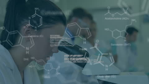 Female Scientist in Laboratory Analyzing Complex Data