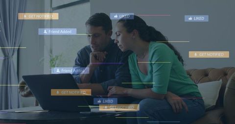 Couple Engaging with Laptop amidst Social Media Notifications
