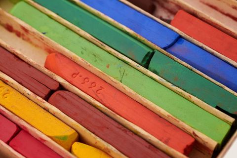 Close-up of colorful pastel sticks in various shades