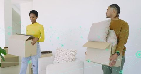 Young Couple Carrying Moving Boxes in Bright Minimal Living Room, Cozy Modern Home Scene