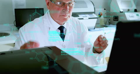 Senior Scientist Analyzing Medical Data in Modern Laboratory