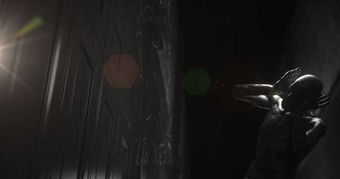 Eerie Figure Holding Head in Haunted Corridor - Download Free Stock Images Pikwizard.com