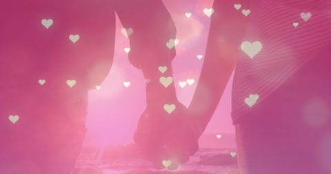 Romantic Couple Holding Hands at Sunset Enveloped in Heart Overlay - Download Free Stock Images Pikwizard.com