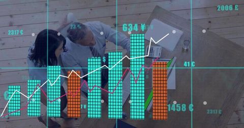 Colleagues reviewing financial charts in overhead view with laptop and analytics overlay