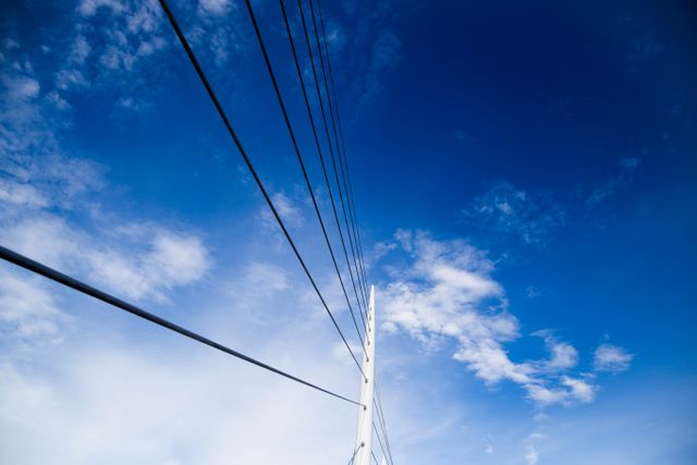 Power Lines against Clear Blue Sky - Download Free Stock Photos Pikwizard.com