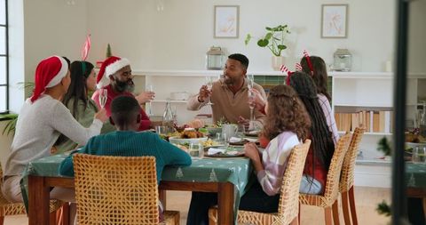 Festive Diverse Family Gathering at Holiday Dinner Table
