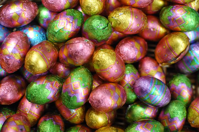 Colorful Chocolate Easter Eggs with Bright Wrappers on Display - Download Free Stock Photos Pikwizard.com